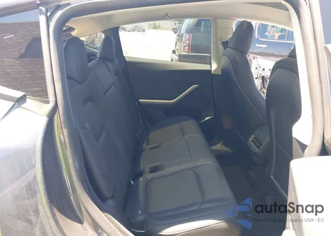 2023 Tesla Model Y Rwd from USA, damaged, VIN 7SAYGDED6PF948127